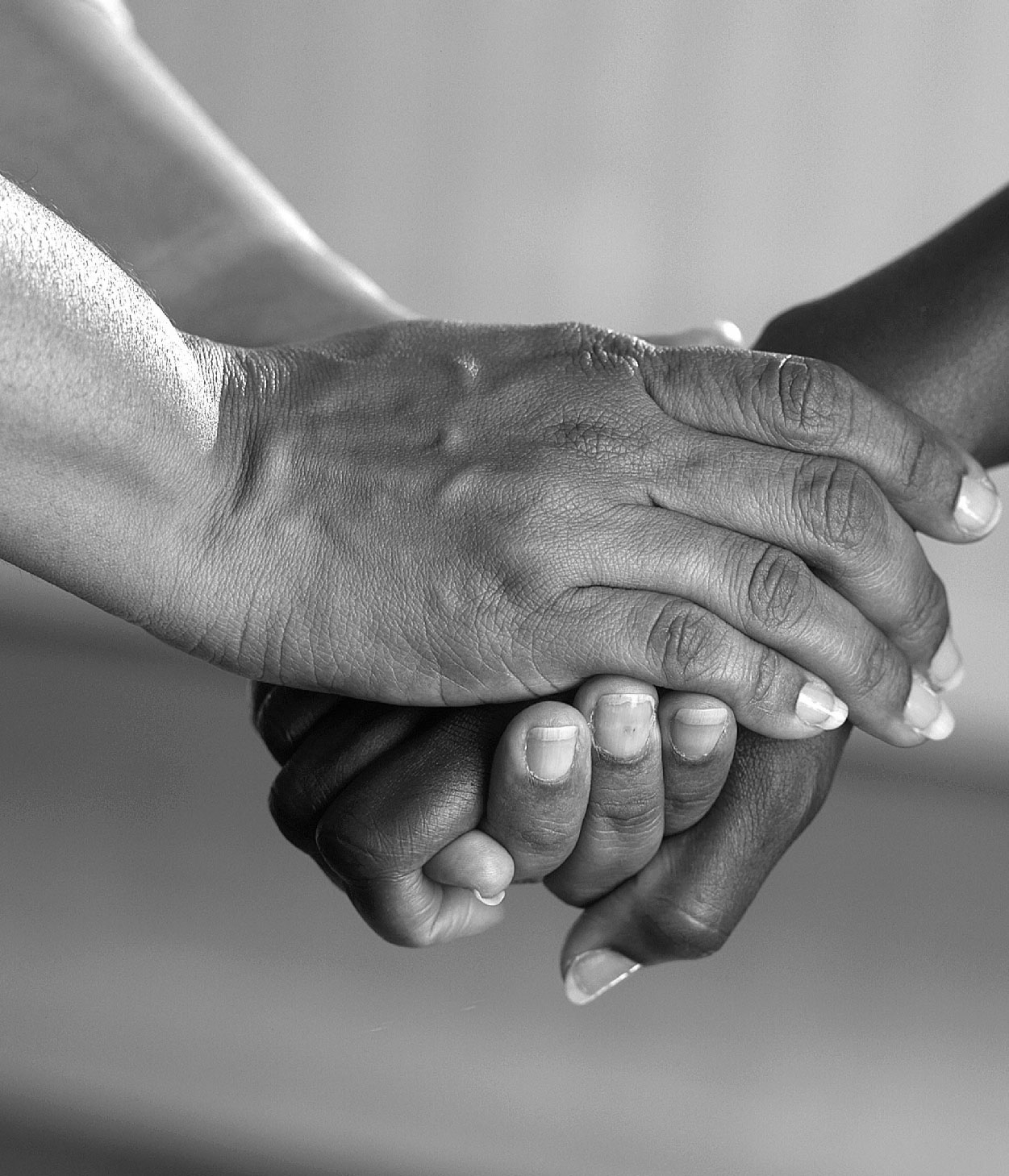 Two people holding hands